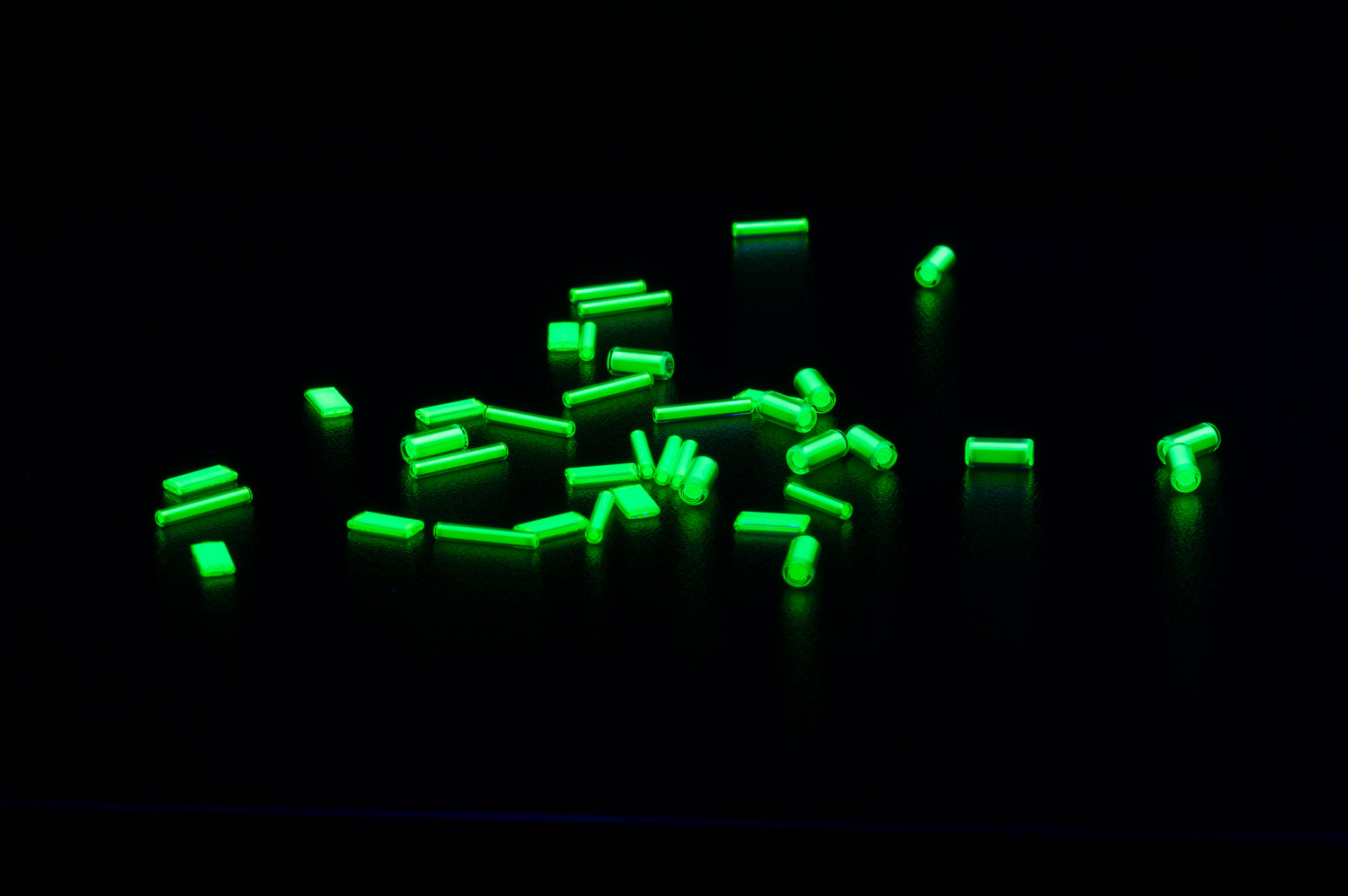 Glowing green tritium tubes